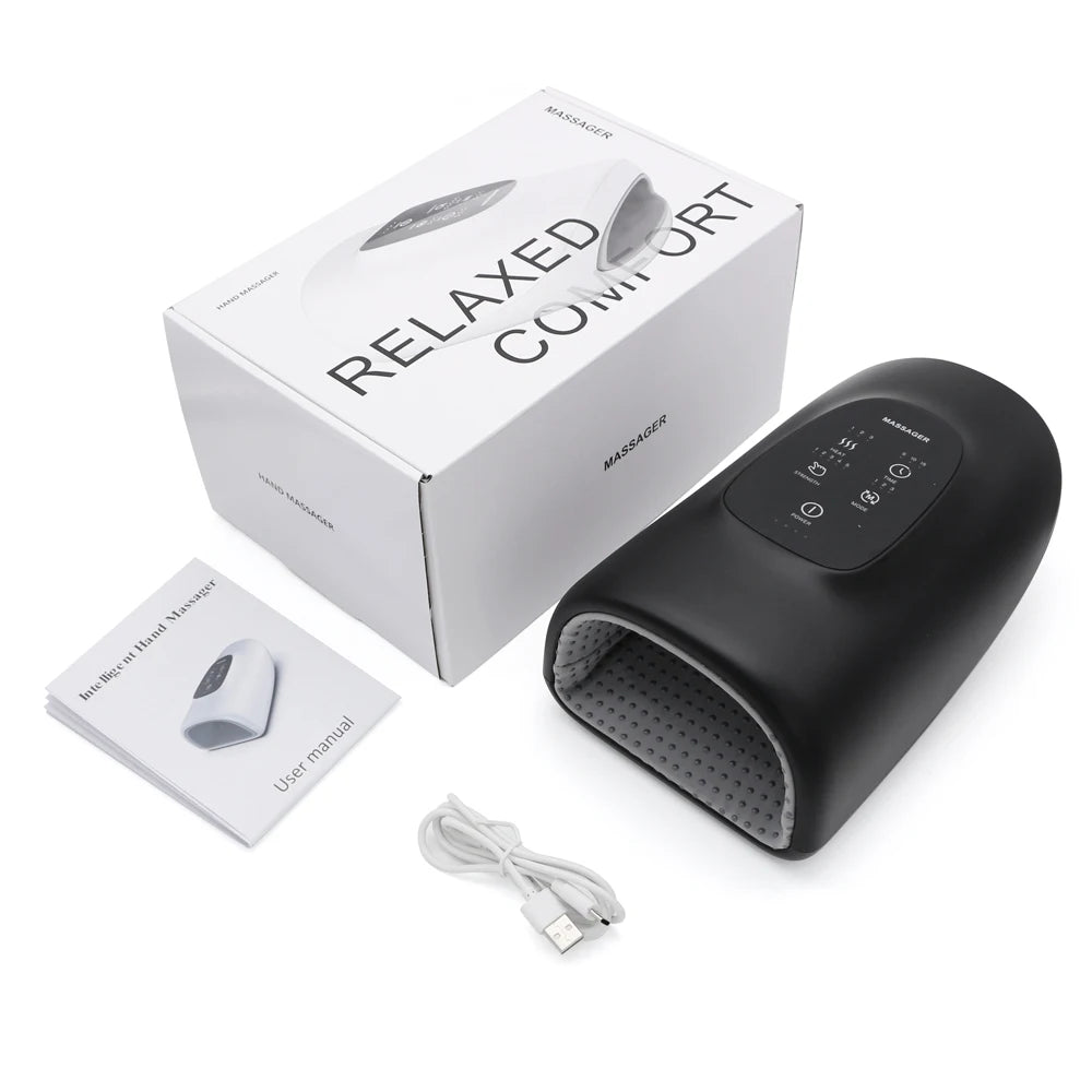 Black Wireless Hand Massager in its box with charging cable and instruction manual included.