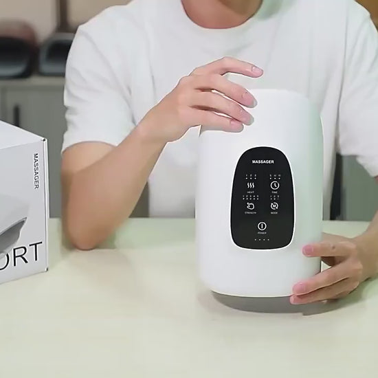 Demonstration of wireless hand massager setup, mode selection, and using heat therapy for muscle and arthritis relief.