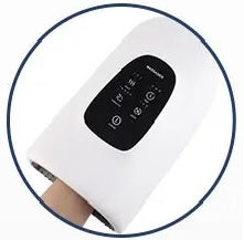 Hand entering massager with palm facing down, starting massage process.