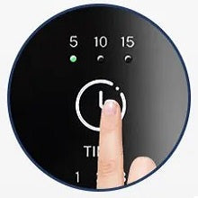 Choosing massage session time (5, 10, or 15 minutes) by pressing timing button.